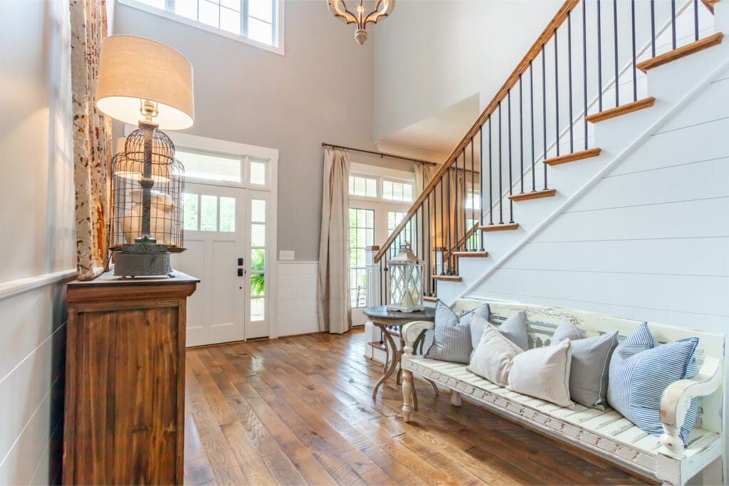 mixed textures and earth tones in an entryway with staircase
